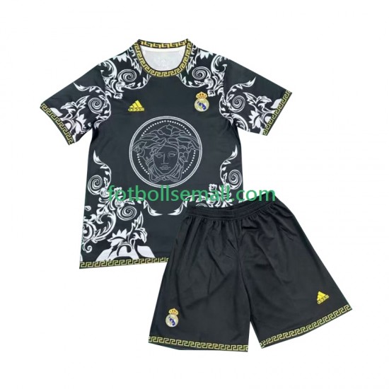 Svart Matchtröjor Real Madrid Versace Edition 2024-2025 Kortärmad till Barn (1:a ställ)
