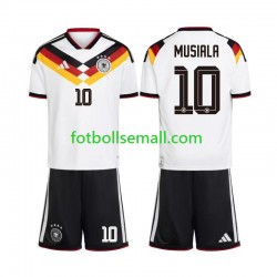 Matchtröjor Tyskland Jamal Musiala 10 World Cup 2026 Kortärmad till Barn (1:a ställ) Matchtröjor Tyskland Jamal Musiala 10 World Cup 2026 Kortärmad till Barn (1:a ställ)